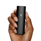 Vaporisateur Pax mini tenu dans la main. Maison Sativa, Cherbourg-en-cotentin. Vaporisateur CBD
